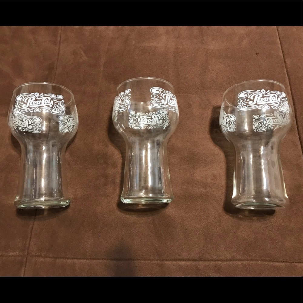 Set of three vintage Pepsi-Cola drinking glasses.